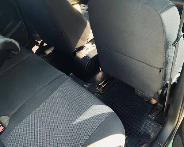 Зеленый Пежо 307, объемом двигателя 1.36 л и пробегом 237 тыс. км за 3500 $, фото 5 на Automoto.ua