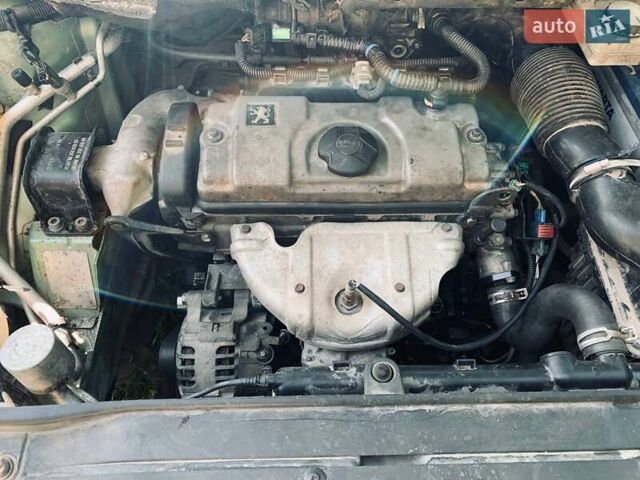 Зеленый Пежо 307, объемом двигателя 1.36 л и пробегом 237 тыс. км за 3500 $, фото 4 на Automoto.ua