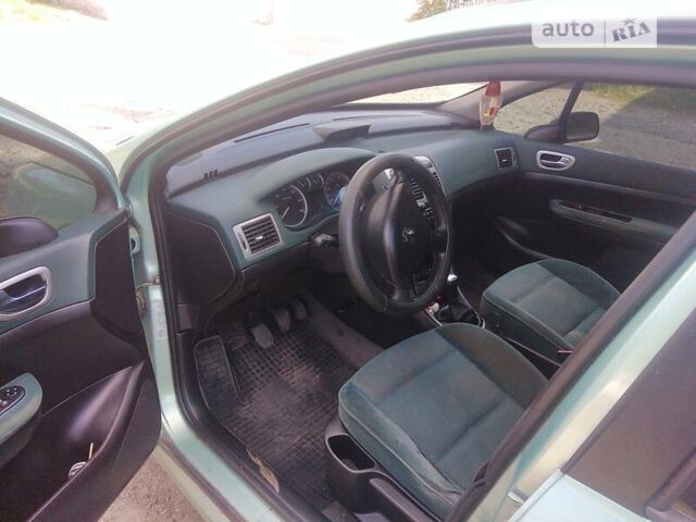 Зелений Пежо 307, об'ємом двигуна 2 л та пробігом 397 тис. км за 4000 $, фото 5 на Automoto.ua