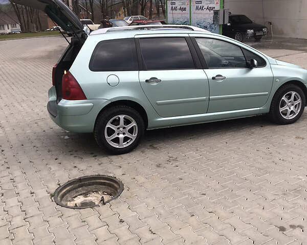 Зелений Пежо 307, об'ємом двигуна 2 л та пробігом 305 тис. км за 4400 $, фото 4 на Automoto.ua