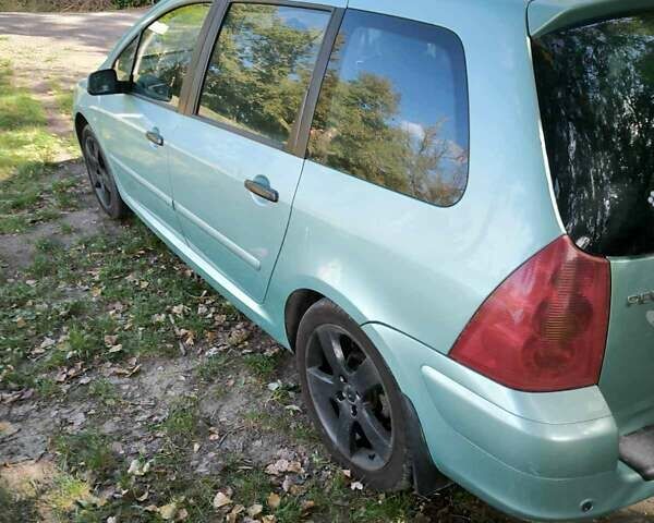 Зеленый Пежо 307, объемом двигателя 1.6 л и пробегом 275 тыс. км за 3500 $, фото 5 на Automoto.ua