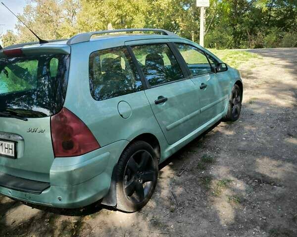 Зеленый Пежо 307, объемом двигателя 1.6 л и пробегом 275 тыс. км за 3500 $, фото 2 на Automoto.ua