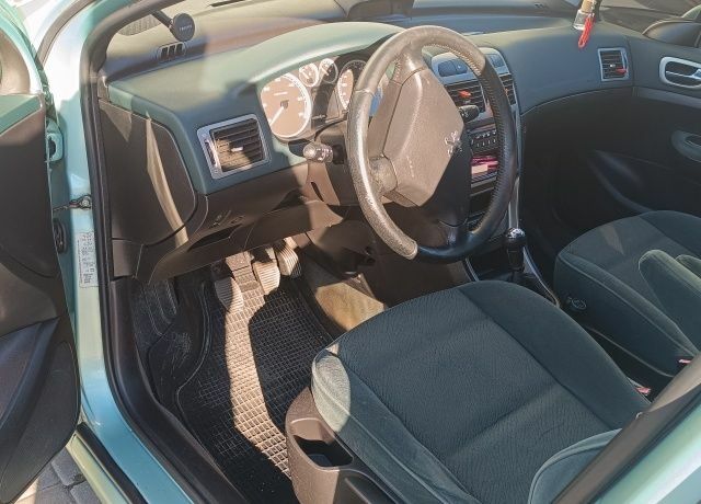 Зелений Пежо 307, об'ємом двигуна 2 л та пробігом 310 тис. км за 3700 $, фото 5 на Automoto.ua