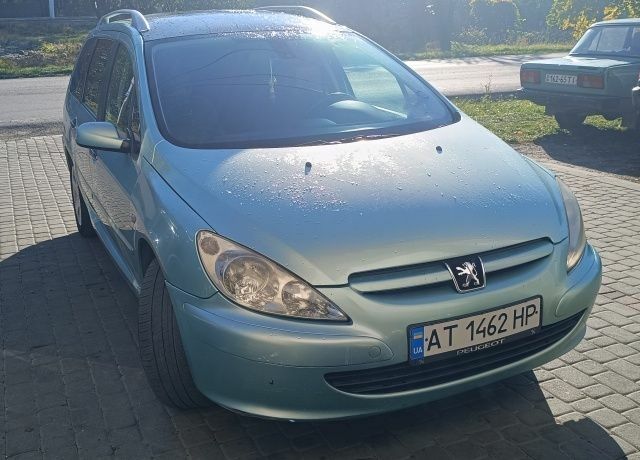 Зелений Пежо 307, об'ємом двигуна 2 л та пробігом 310 тис. км за 3700 $, фото 2 на Automoto.ua