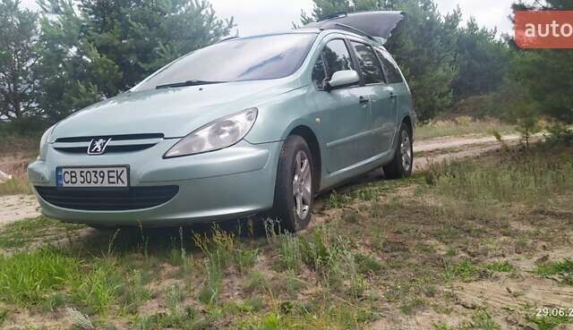 Зелений Пежо 307, об'ємом двигуна 2 л та пробігом 400 тис. км за 3699 $, фото 6 на Automoto.ua