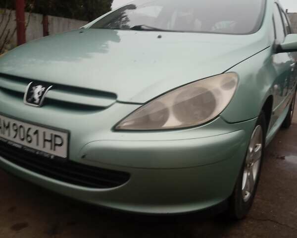 Зелений Пежо 307, об'ємом двигуна 1.59 л та пробігом 300 тис. км за 3799 $, фото 6 на Automoto.ua
