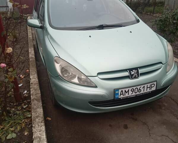 Зелений Пежо 307, об'ємом двигуна 1.59 л та пробігом 300 тис. км за 3799 $, фото 3 на Automoto.ua