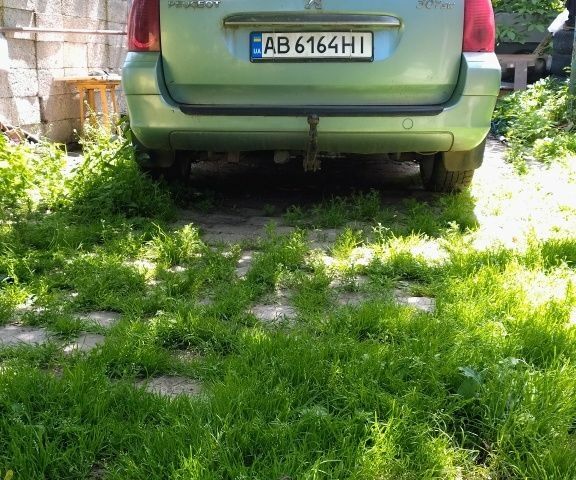 Зеленый Пежо 307, объемом двигателя 2 л и пробегом 392 тыс. км за 1800 $, фото 1 на Automoto.ua