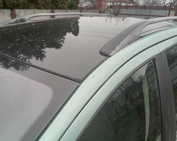 Зелений Пежо 307, об'ємом двигуна 1.59 л та пробігом 300 тис. км за 3799 $, фото 7 на Automoto.ua