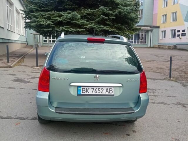 Зеленый Пежо 307, объемом двигателя 1.6 л и пробегом 282 тыс. км за 3900 $, фото 4 на Automoto.ua