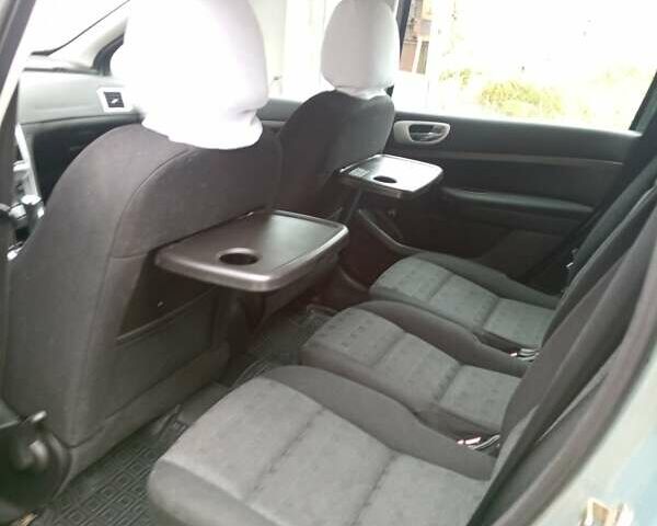 Зеленый Пежо 307, объемом двигателя 1.59 л и пробегом 282 тыс. км за 3900 $, фото 13 на Automoto.ua