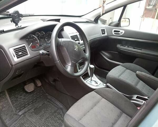 Зеленый Пежо 307, объемом двигателя 1.59 л и пробегом 282 тыс. км за 3900 $, фото 10 на Automoto.ua