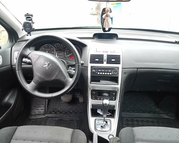 Зеленый Пежо 307, объемом двигателя 1.59 л и пробегом 282 тыс. км за 3900 $, фото 11 на Automoto.ua