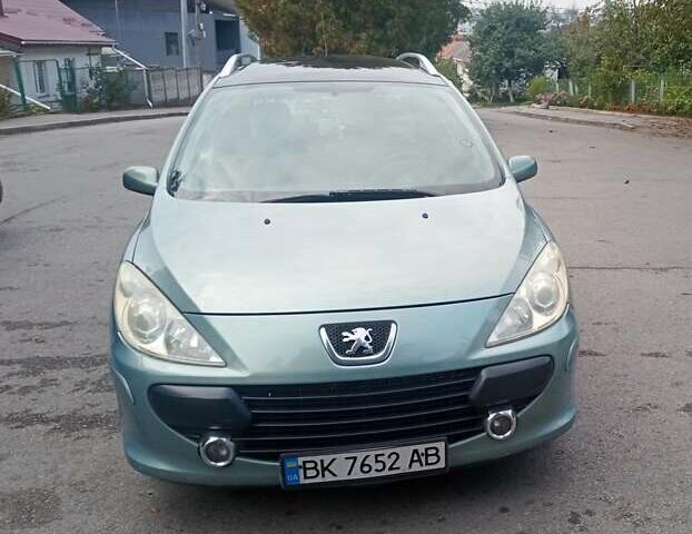 Зеленый Пежо 307, объемом двигателя 1.59 л и пробегом 282 тыс. км за 3900 $, фото 4 на Automoto.ua