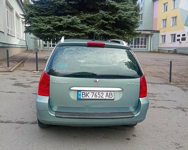 Зеленый Пежо 307, объемом двигателя 1.59 л и пробегом 282 тыс. км за 3900 $, фото 2 на Automoto.ua