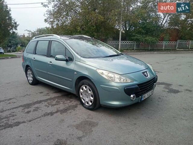 Зеленый Пежо 307, объемом двигателя 1.59 л и пробегом 282 тыс. км за 3900 $, фото 5 на Automoto.ua