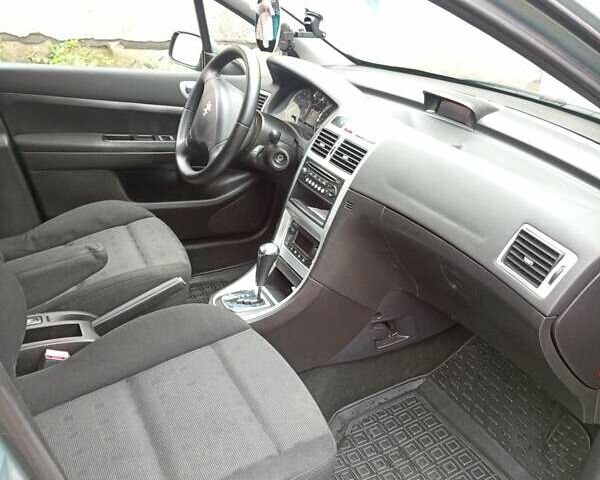 Зеленый Пежо 307, объемом двигателя 1.59 л и пробегом 282 тыс. км за 3900 $, фото 16 на Automoto.ua