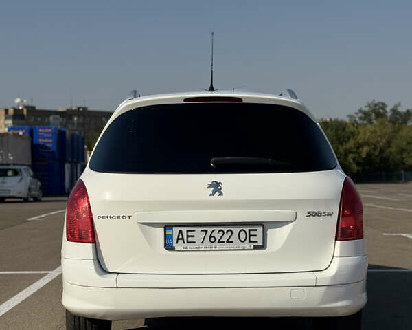 Белый Пежо 308, объемом двигателя 1.6 л и пробегом 183 тыс. км за 8000 $, фото 5 на Automoto.ua