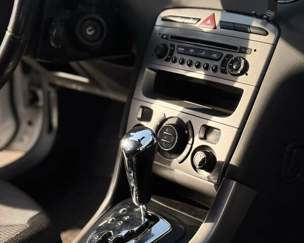 Белый Пежо 308, объемом двигателя 1.6 л и пробегом 183 тыс. км за 8000 $, фото 20 на Automoto.ua