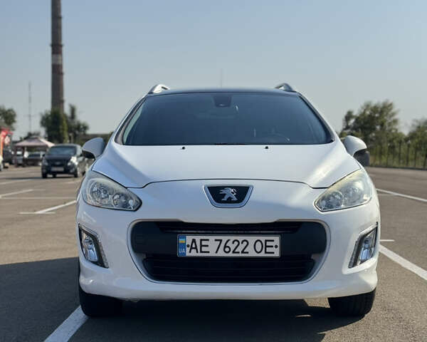 Белый Пежо 308, объемом двигателя 1.6 л и пробегом 183 тыс. км за 8000 $, фото 1 на Automoto.ua
