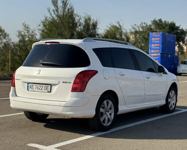 Белый Пежо 308, объемом двигателя 1.6 л и пробегом 183 тыс. км за 8000 $, фото 7 на Automoto.ua
