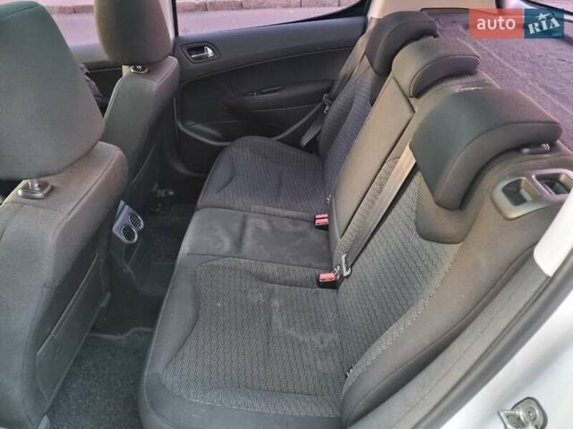 Белый Пежо 308, объемом двигателя 1.6 л и пробегом 135 тыс. км за 7400 $, фото 13 на Automoto.ua