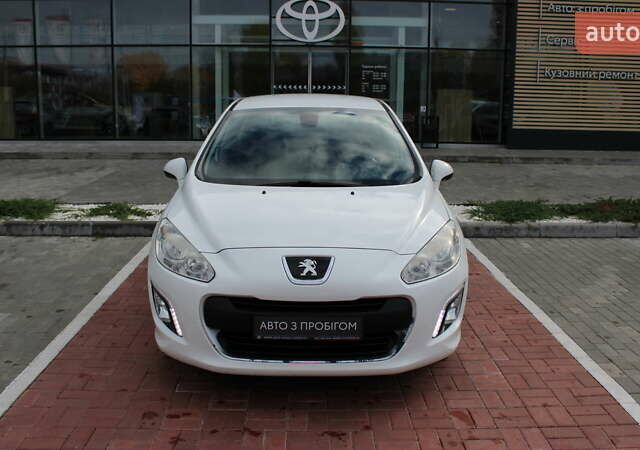 Белый Пежо 308, объемом двигателя 1.56 л и пробегом 173 тыс. км за 7300 $, фото 1 на Automoto.ua