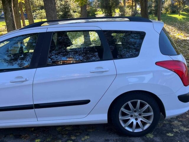 Белый Пежо 308, объемом двигателя 1.6 л и пробегом 280 тыс. км за 4890 $, фото 6 на Automoto.ua