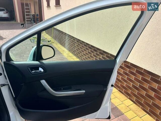 Білий Пежо 308, об'ємом двигуна 1.4 л та пробігом 141 тис. км за 5149 $, фото 23 на Automoto.ua