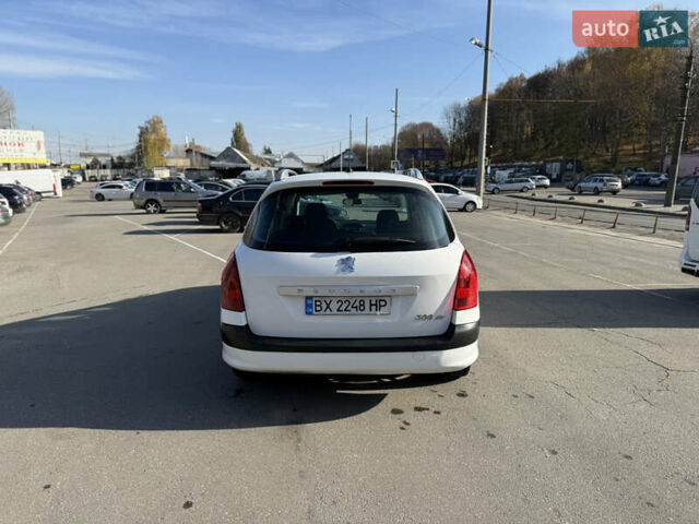 Белый Пежо 308, объемом двигателя 1.56 л и пробегом 265 тыс. км за 4500 $, фото 5 на Automoto.ua