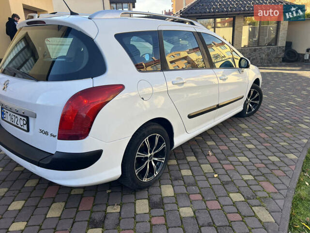 Білий Пежо 308, об'ємом двигуна 1.56 л та пробігом 321 тис. км за 4000 $, фото 19 на Automoto.ua