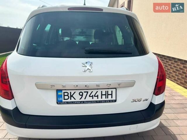 Білий Пежо 308, об'ємом двигуна 1.4 л та пробігом 141 тис. км за 5149 $, фото 1 на Automoto.ua