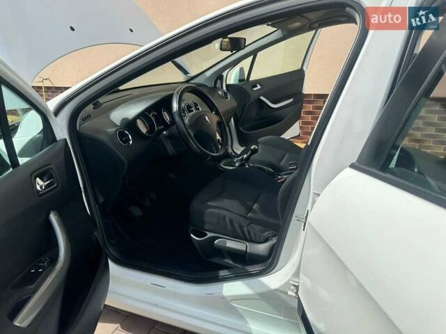 Білий Пежо 308, об'ємом двигуна 1.4 л та пробігом 141 тис. км за 5149 $, фото 11 на Automoto.ua