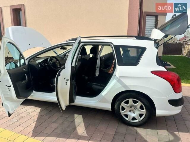 Білий Пежо 308, об'ємом двигуна 1.4 л та пробігом 141 тис. км за 5149 $, фото 12 на Automoto.ua