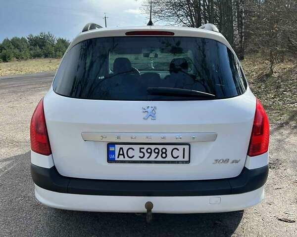 Белый Пежо 308, объемом двигателя 1.4 л и пробегом 196 тыс. км за 4100 $, фото 7 на Automoto.ua