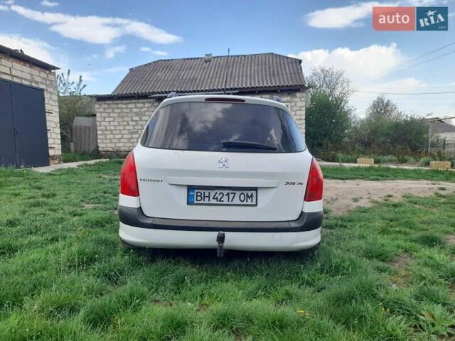 Белый Пежо 308, объемом двигателя 1.6 л и пробегом 260 тыс. км за 5200 $, фото 5 на Automoto.ua