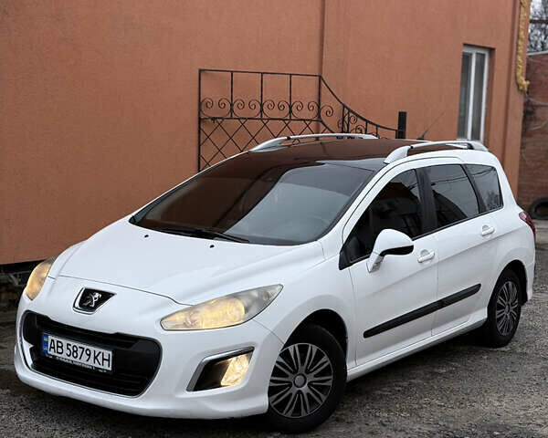 Белый Пежо 308, объемом двигателя 1.56 л и пробегом 234 тыс. км за 5900 $, фото 1 на Automoto.ua
