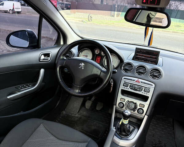 Белый Пежо 308, объемом двигателя 1.56 л и пробегом 234 тыс. км за 5900 $, фото 9 на Automoto.ua