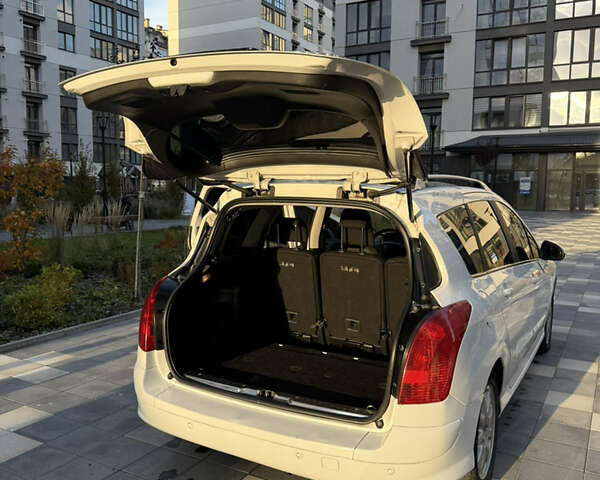 Белый Пежо 308, объемом двигателя 2 л и пробегом 272 тыс. км за 5500 $, фото 7 на Automoto.ua