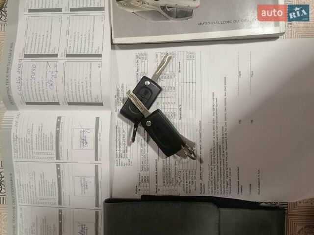 Белый Пежо 308, объемом двигателя 1.6 л и пробегом 224 тыс. км за 3900 $, фото 1 на Automoto.ua