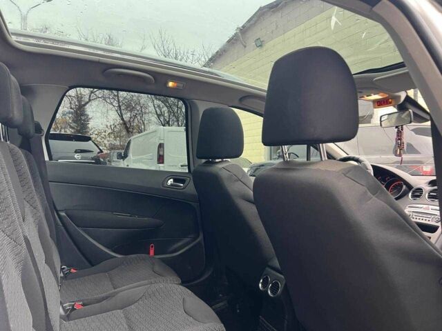 Белый Пежо 308, объемом двигателя 2 л и пробегом 273 тыс. км за 5800 $, фото 10 на Automoto.ua