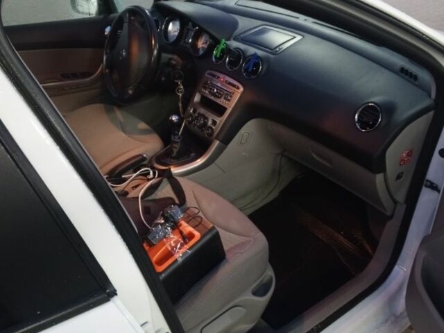 Білий Пежо 308, об'ємом двигуна 1.6 л та пробігом 400 тис. км за 5900 $, фото 7 на Automoto.ua