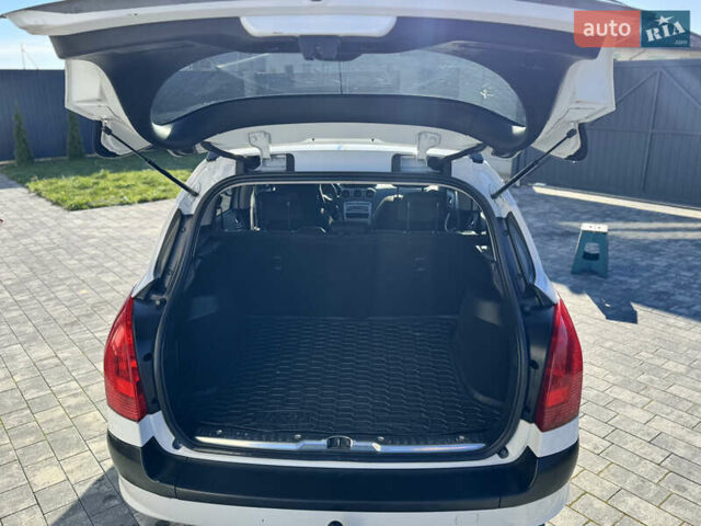 Белый Пежо 308, объемом двигателя 1.6 л и пробегом 220 тыс. км за 5500 $, фото 22 на Automoto.ua