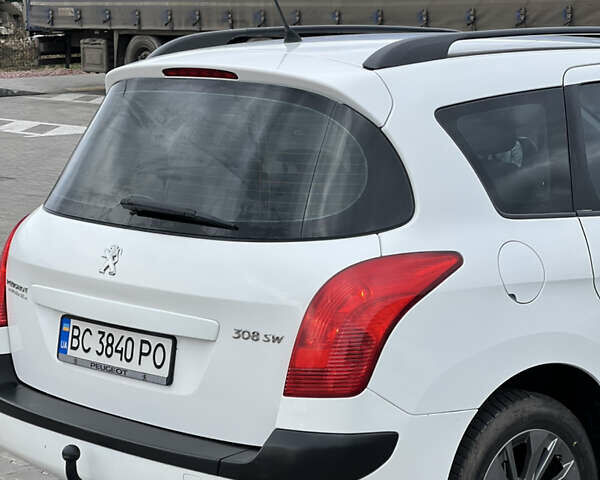 Белый Пежо 308, объемом двигателя 1.6 л и пробегом 243 тыс. км за 5400 $, фото 8 на Automoto.ua