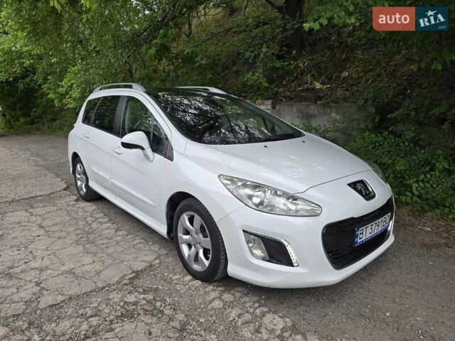 Белый Пежо 308, объемом двигателя 1.56 л и пробегом 228 тыс. км за 6700 $, фото 9 на Automoto.ua