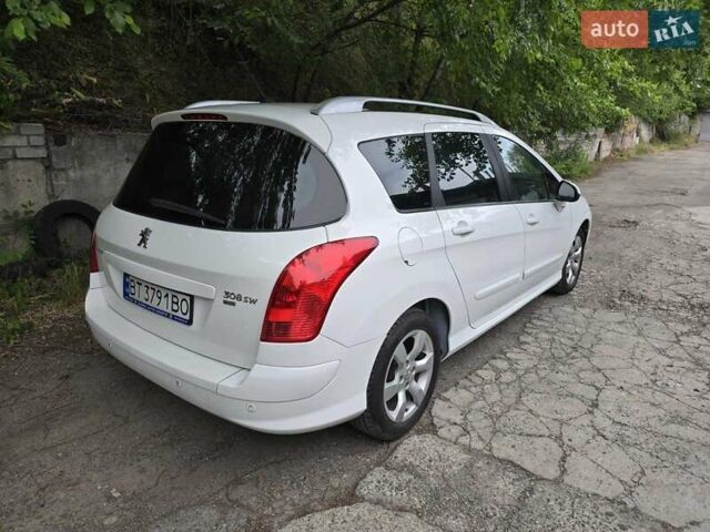 Белый Пежо 308, объемом двигателя 1.56 л и пробегом 228 тыс. км за 6700 $, фото 7 на Automoto.ua
