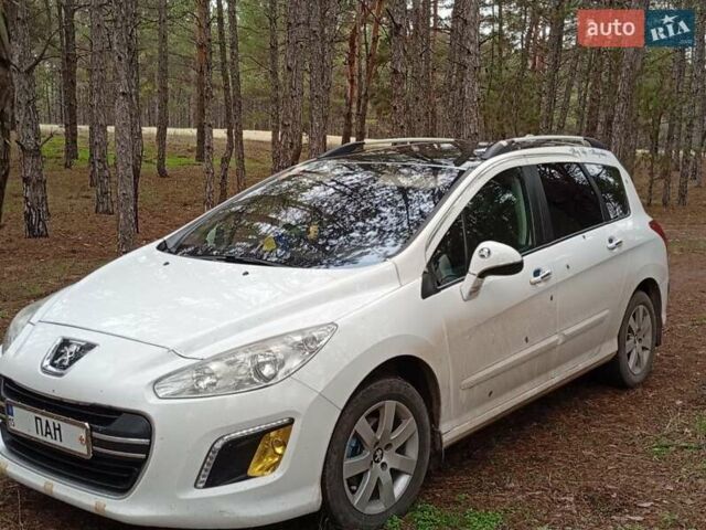 Белый Пежо 308, объемом двигателя 1.61 л и пробегом 230 тыс. км за 6600 $, фото 4 на Automoto.ua