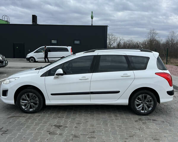 Белый Пежо 308, объемом двигателя 1.6 л и пробегом 243 тыс. км за 5400 $, фото 4 на Automoto.ua