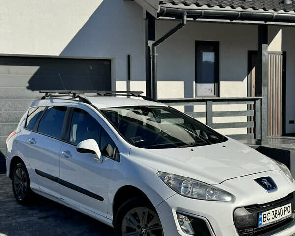 Белый Пежо 308, объемом двигателя 1.6 л и пробегом 220 тыс. км за 5500 $, фото 8 на Automoto.ua