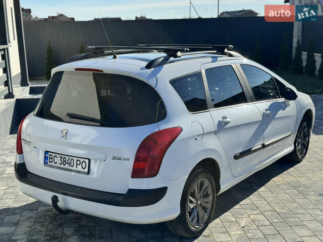 Белый Пежо 308, объемом двигателя 1.6 л и пробегом 220 тыс. км за 5500 $, фото 13 на Automoto.ua